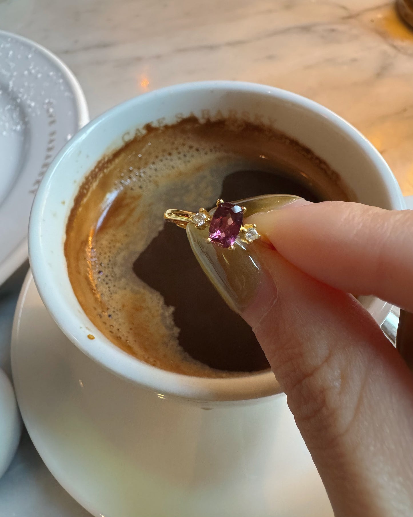 garnet silver ring with coffee
