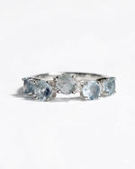 five aquamarine stones and cubic zirconia silver band