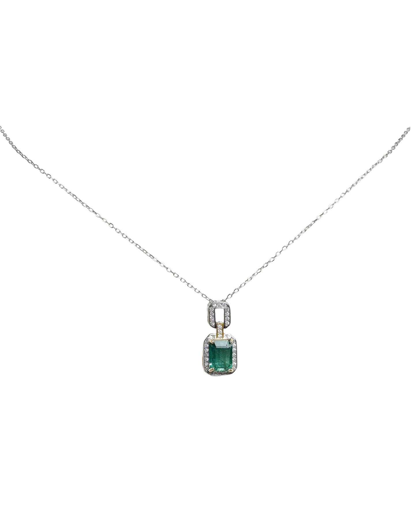 Natural emerald silver necklace with 18k gold plated claw setting and cubic zirconia on the side closeup look. Paired with 925 sterling silver.